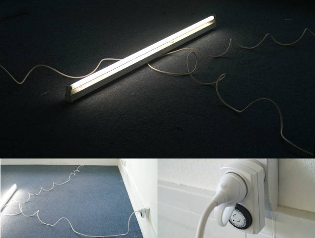 An office neon light plugged in three different outlets at the same time