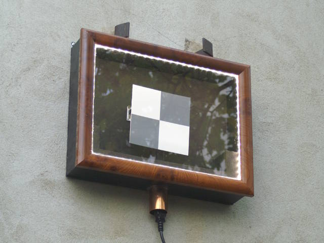 A waterproof box containing a pattern to attract drones, and leds.